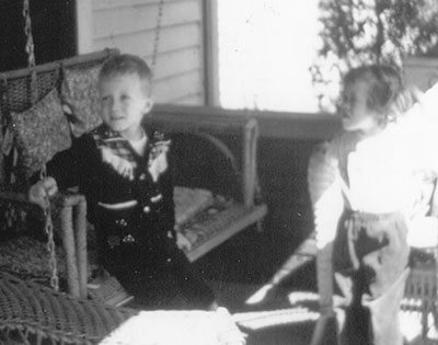 I did get a little huffy sometimes. With my brother Curt on my grandparents' front porch.