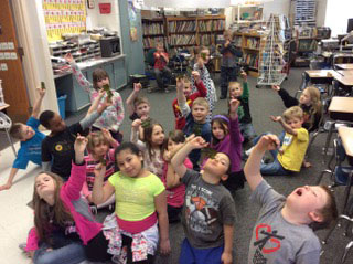 The badge of honor in Ed's class was trying things that are hard. These students are eating seaweed.