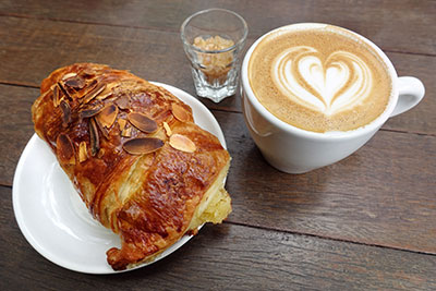 Chocolate almond croissant and coffee