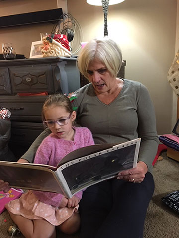 Emmersyn and Grammy share a read-aloud tradition.
