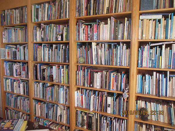 Some of the bookshelves in Lee Bennett Hopkins' office