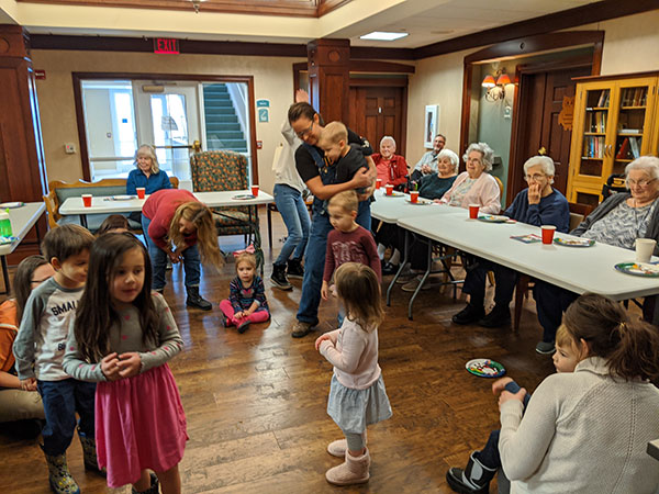 families attend Timeless Tales storytime