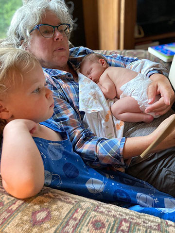 Sylvie, Gram, and Phoebe reading