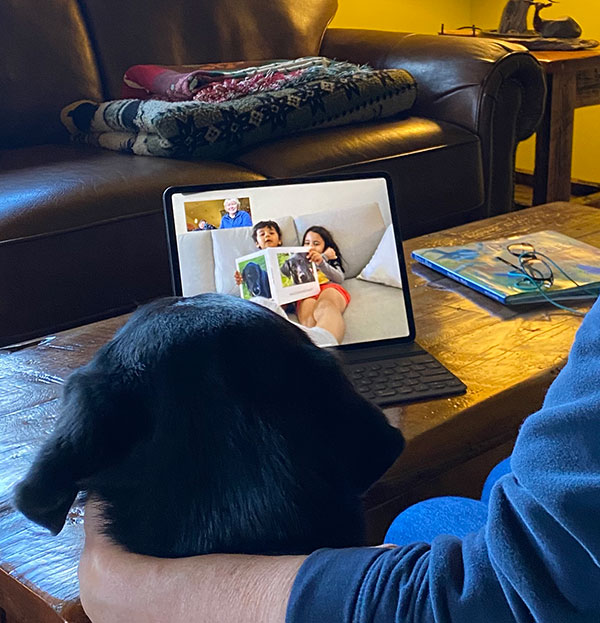 Connie and Peg enjoy a virtual readaloud with their long-distance Reading Team