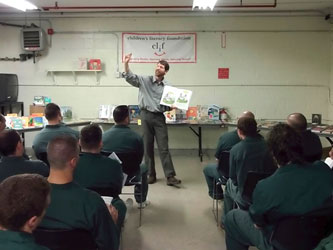 McDougall reading to inmates